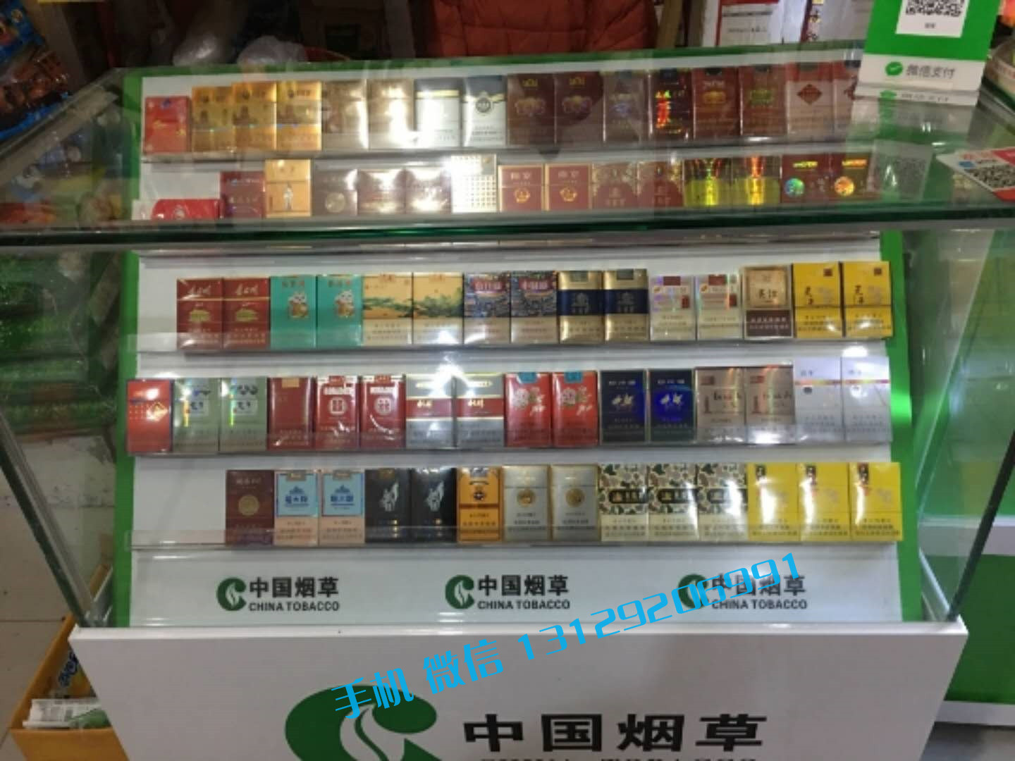 青海玉树收银台超市烟柜陈列图片